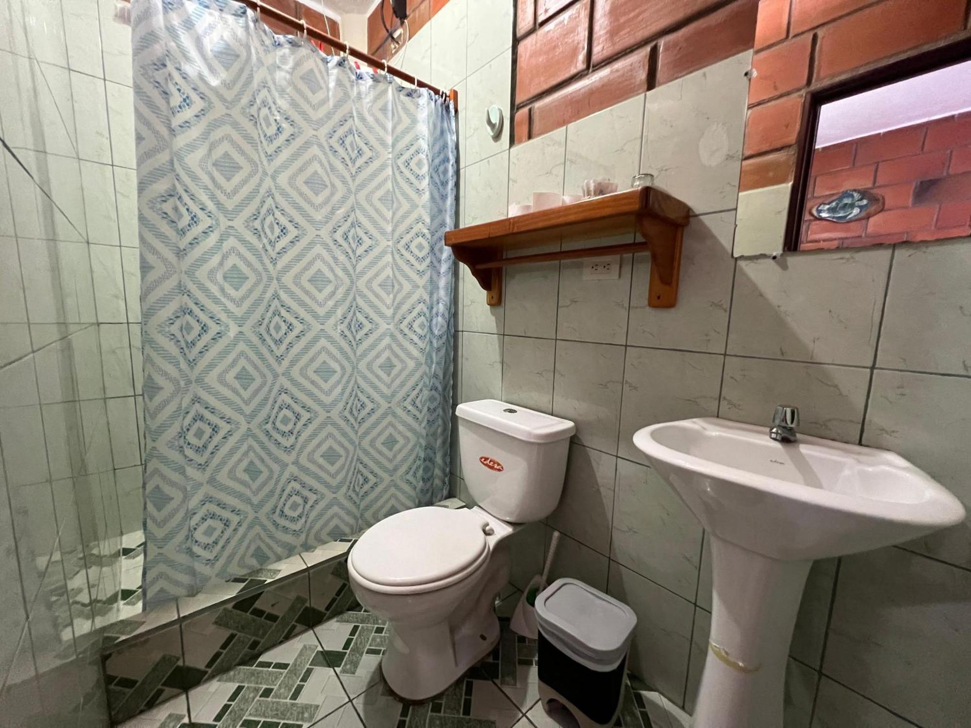 Hostal Cattleya Puerto Baquerizo Moreno Rum bild